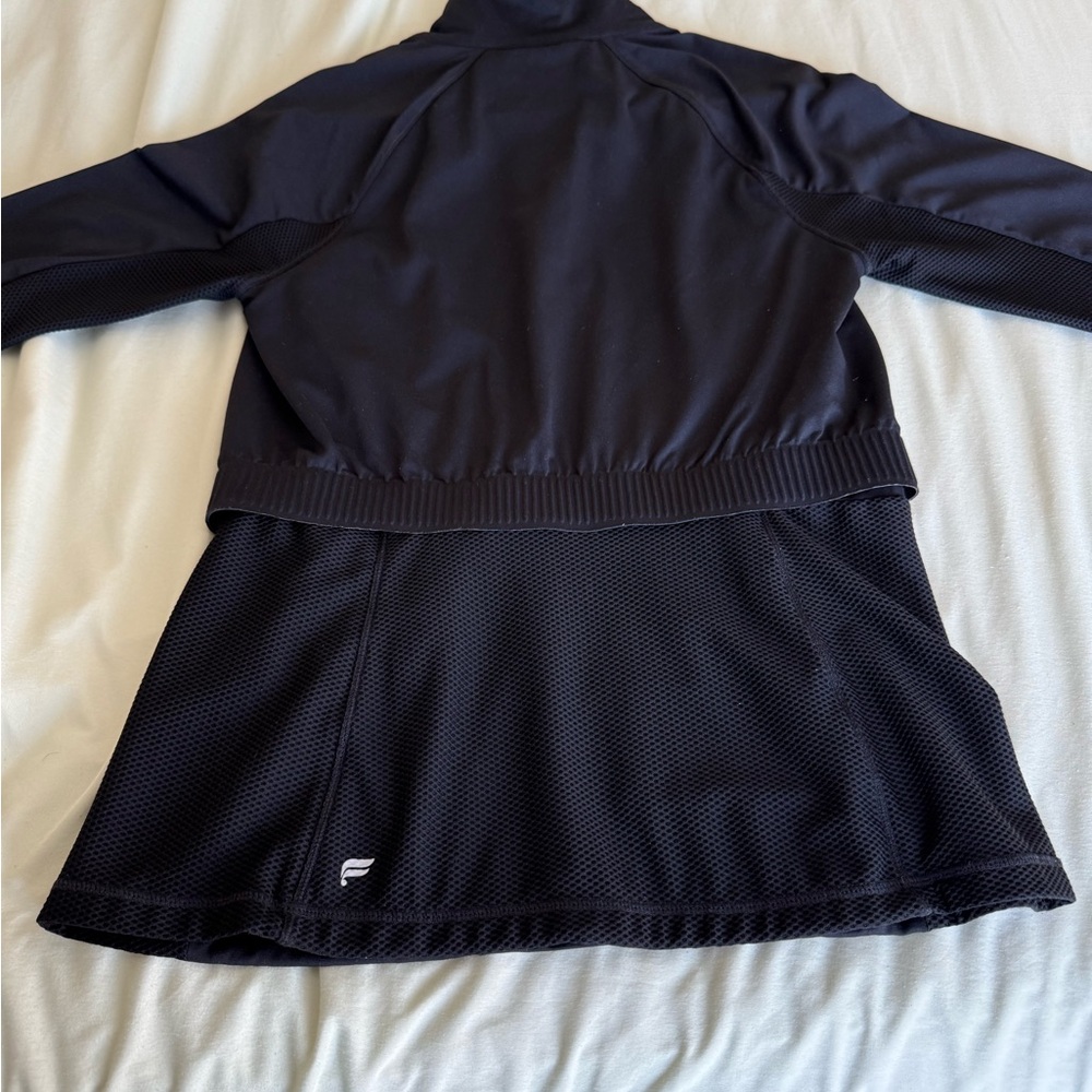 Fabletics half-zip pullover, Size Medium , in good condition.